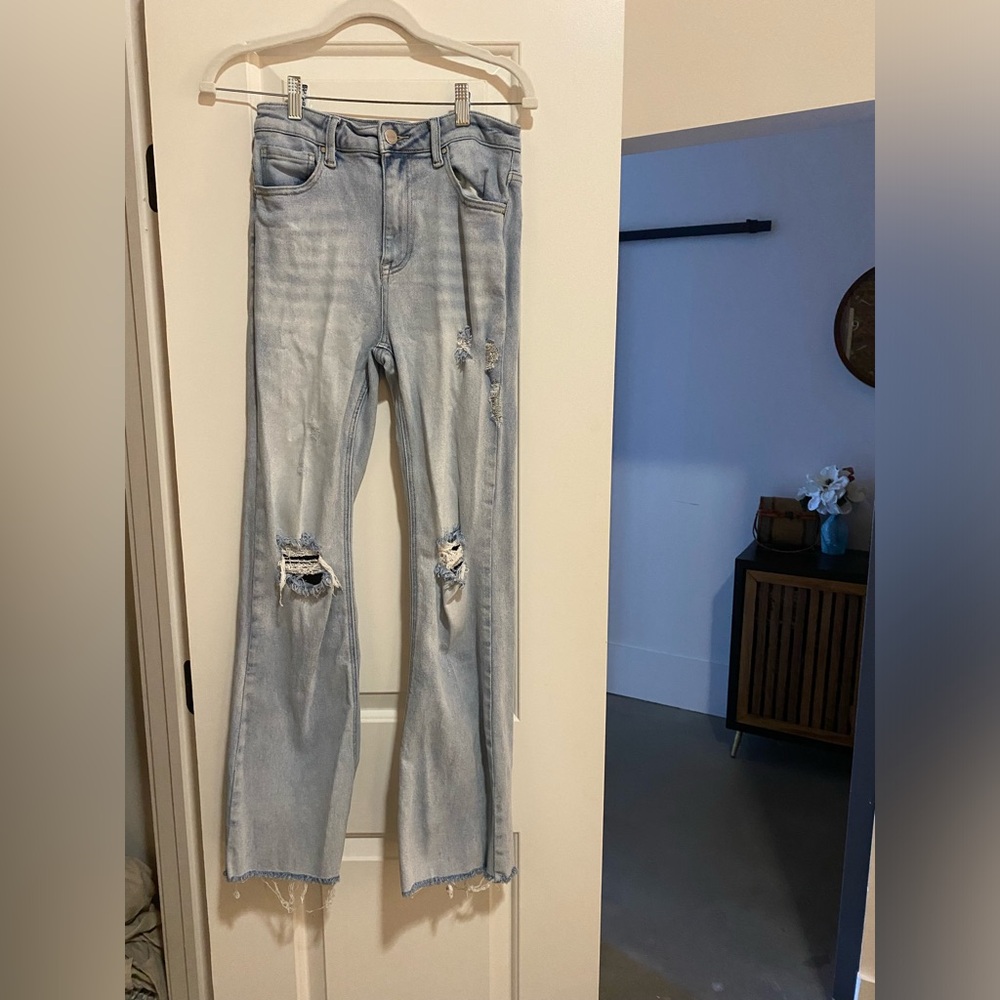 Distressed light wash jeans